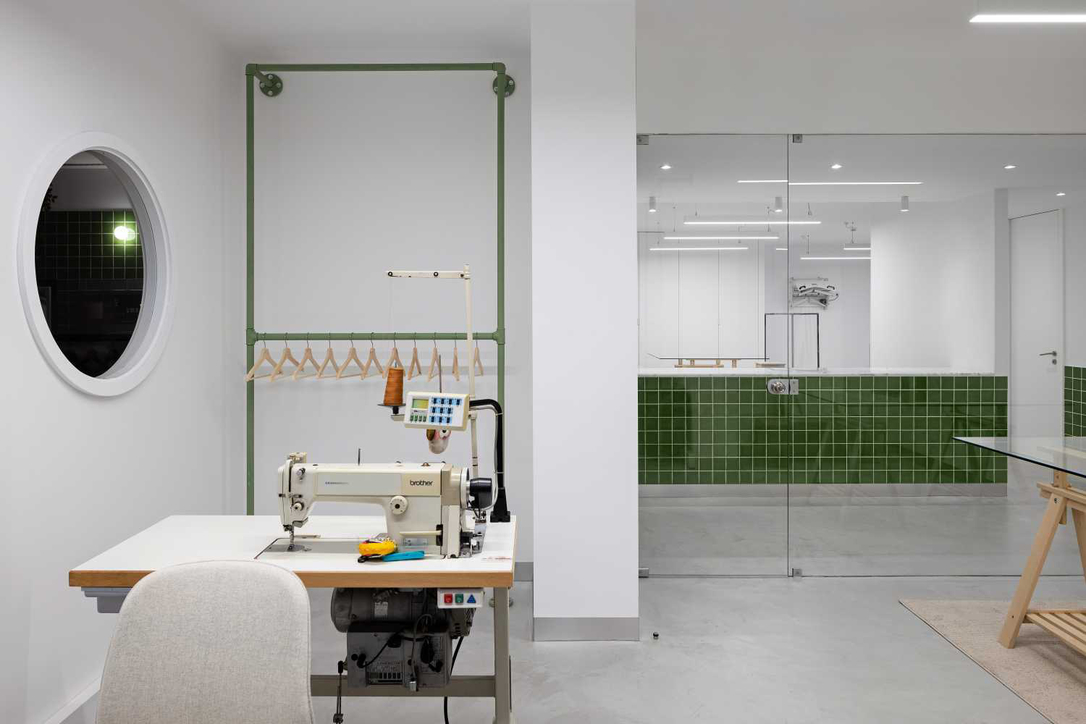 A gridded gate mirrors patterns on the walls A gridded gate mirrors patterns on the walls